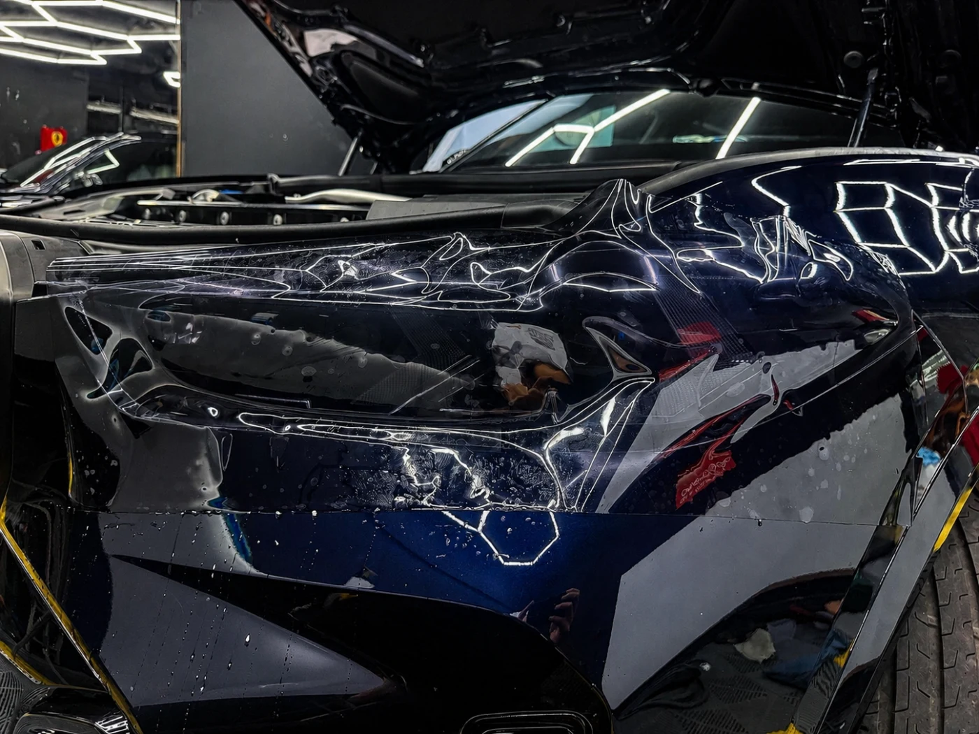 BMW X5 paint protection film being applied to bonnet — CarDetail Lab Dublin