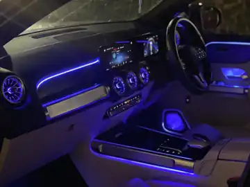 Mercedes-Benz GLB front cabin ambient lighting across dashboard, vents and door trims — CarDetail Lab Dublin